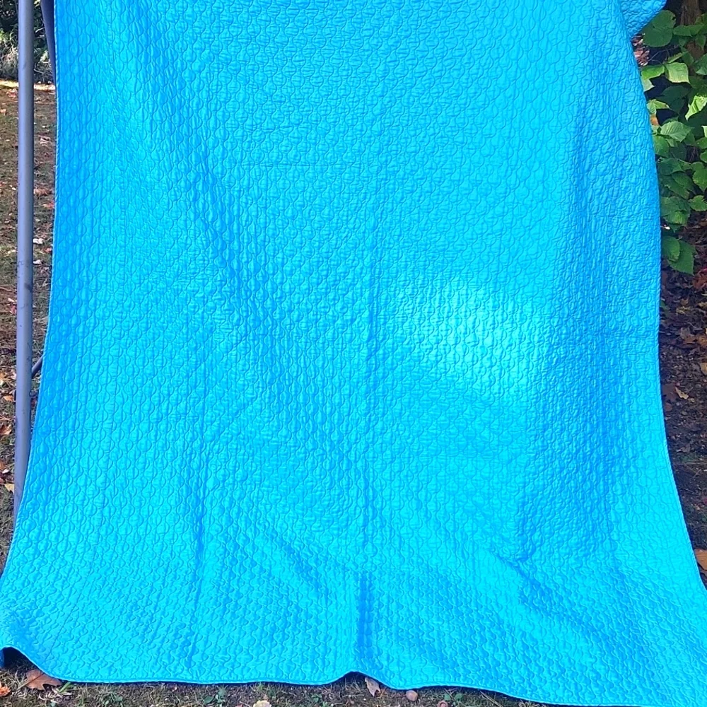 Vintage 1990s blue satin quilted twin size comforter bedspread .